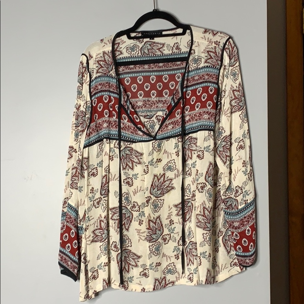 Long sleeve low cut blouse